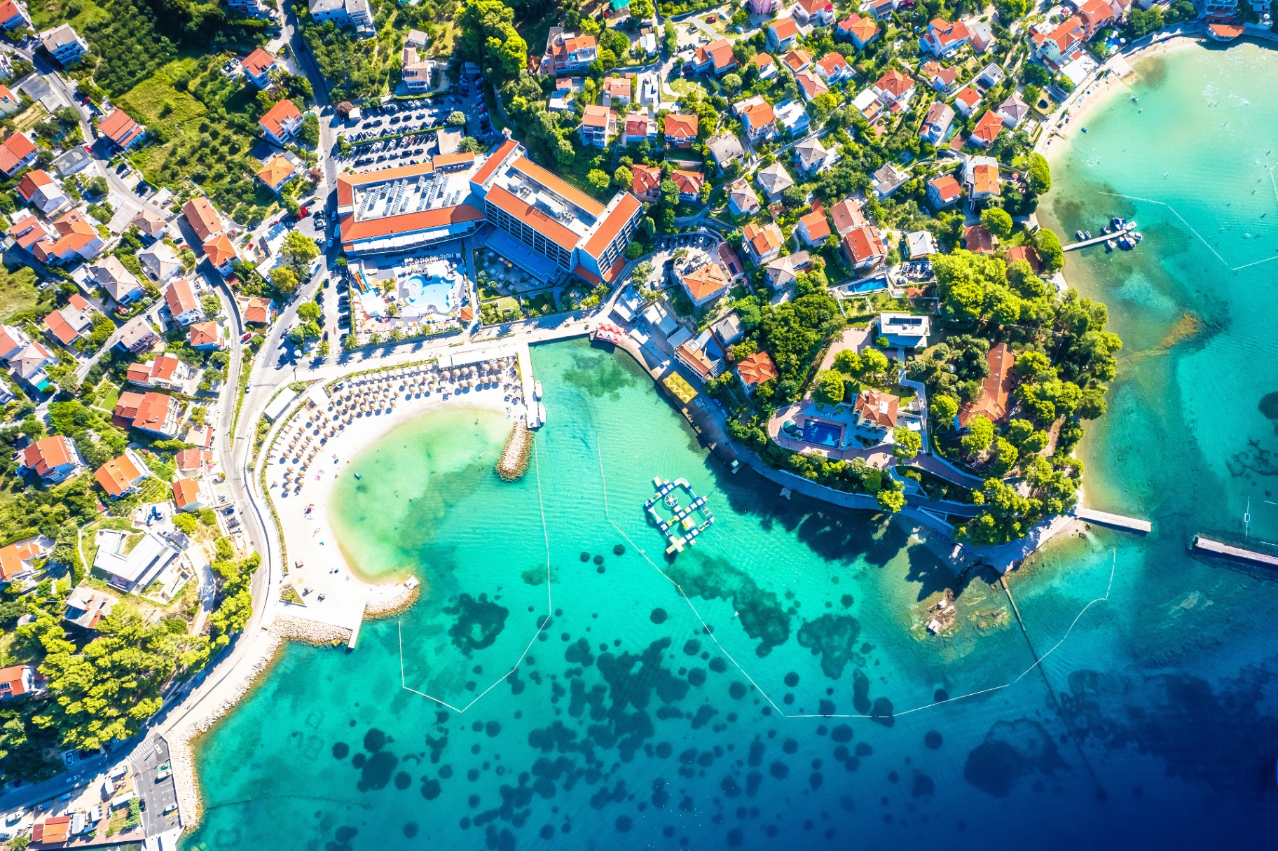 Crystal clear turquoise beach coastline Rab Island hiking trails active travel Croatia adventure retreat