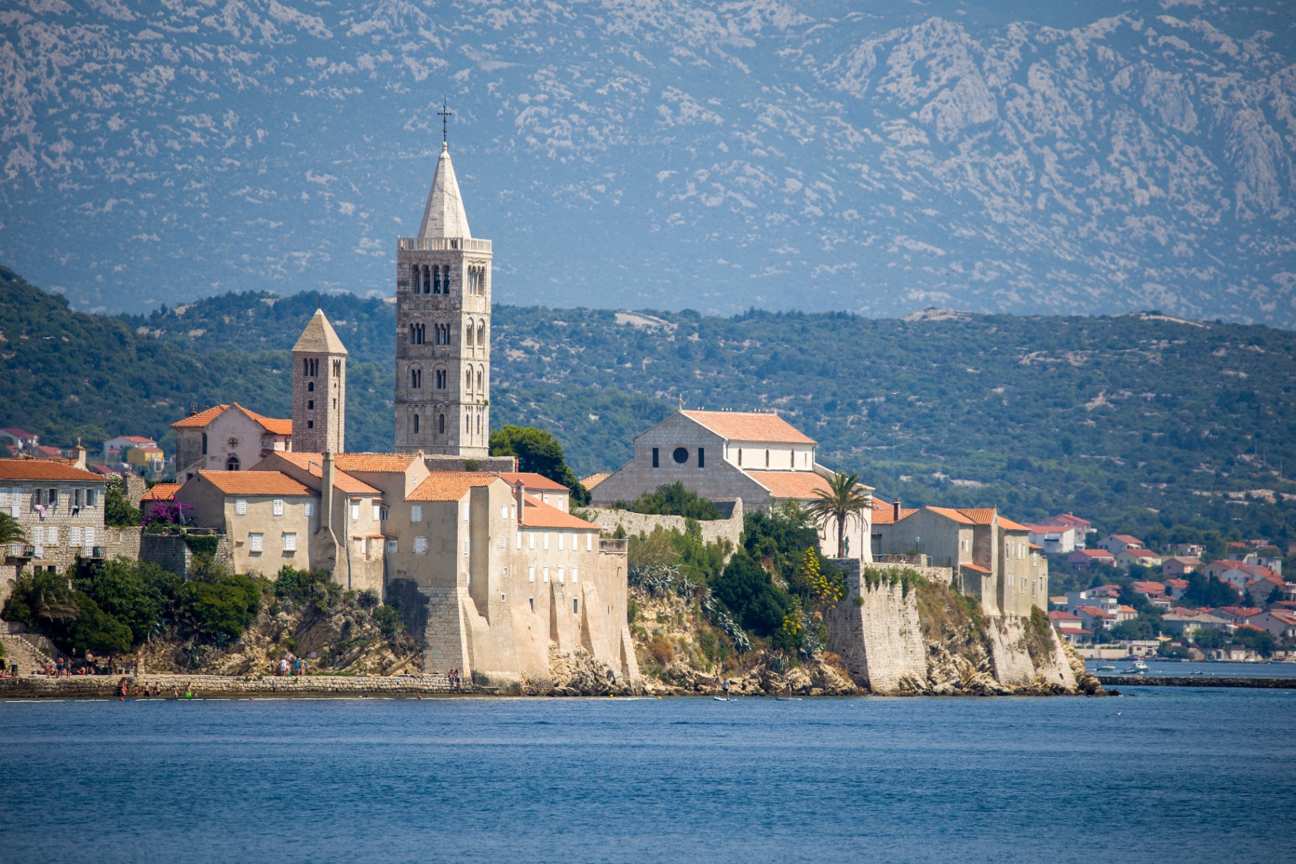 Historic Rab bell tower medieval town mountain backdrop Croatia island retreat growth mindset escape