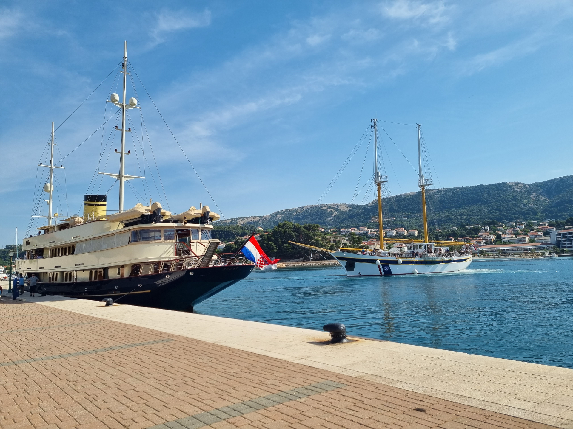 Rab harbor yachts Croatian flag island hopping adventure holidays Croatia small group adventure travel