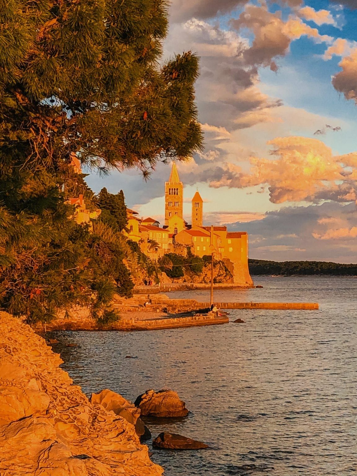 Golden sunset Rab Old Town bell towers medieval old town adventure Croatia growth mindset retreat