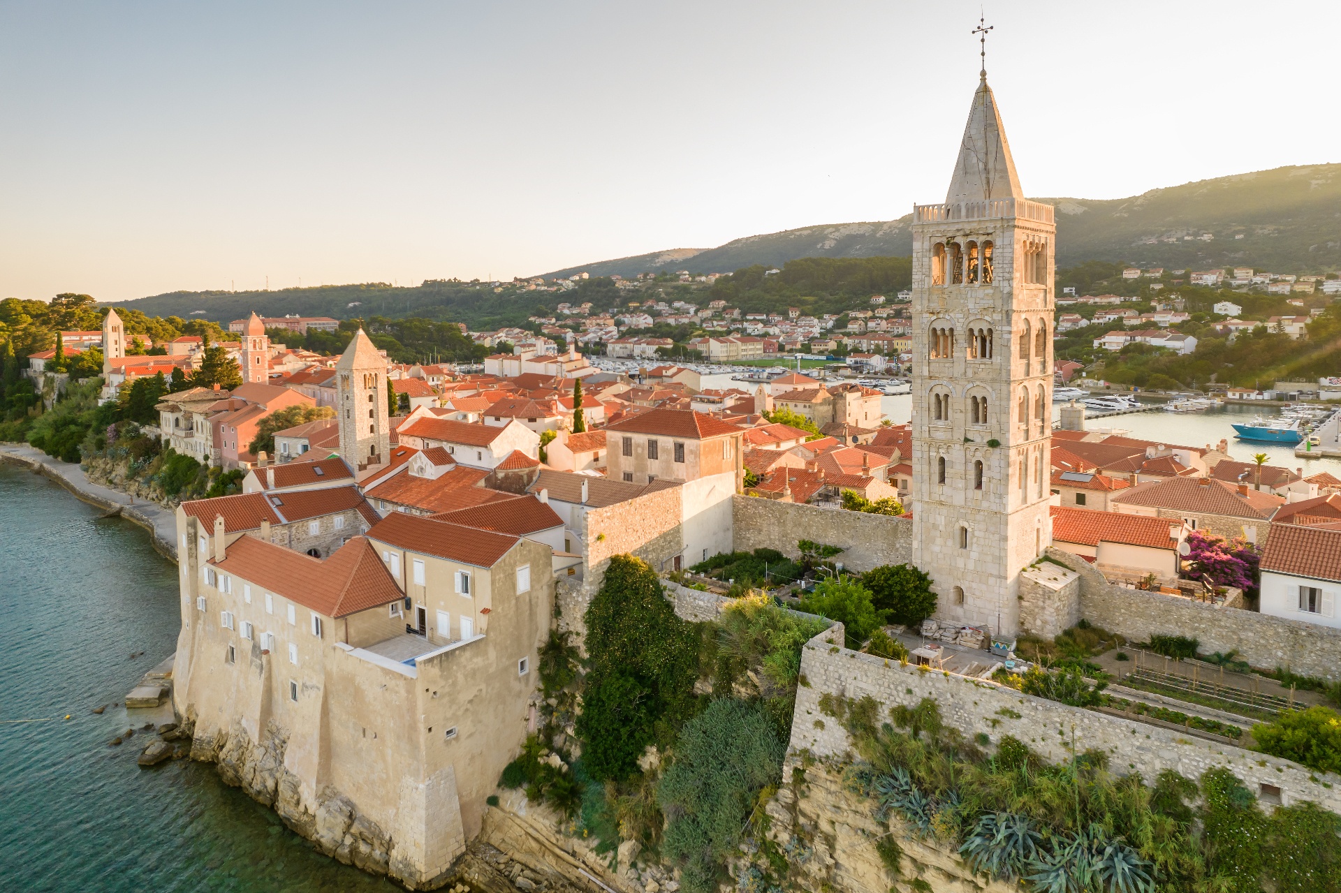 Golden sunset Rab church towers medieval architecture Croatia adventure retreat entrepreneur adventure travel 2026